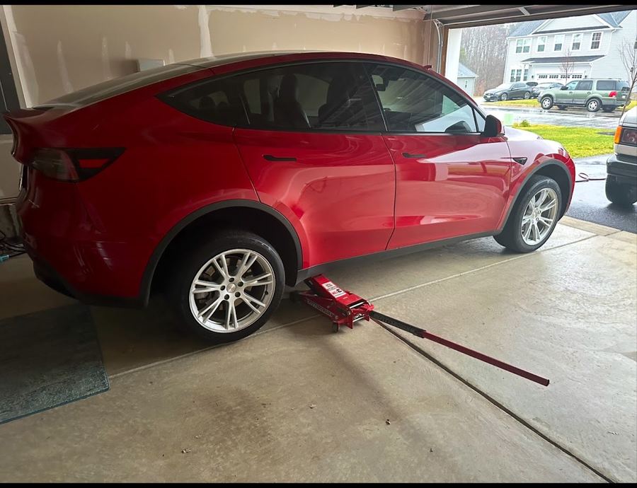 Tire service on a Tesla at the customer's garage